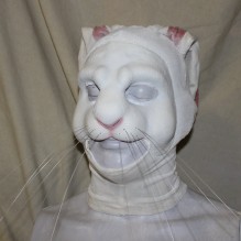 Rabbit Face hot foam latex prosthetic painted in white and put into a hood mask.