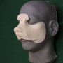 a foam latex prosthetic Bear Nose placed on a plastic human face cast