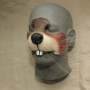 a painted foam latex prosthetic Beaver / Otter Nose placed on a plastic human face cast