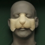 Foam Latex Small Rodent Nose placed on a plastic human face cast