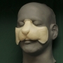 Foam Latex Small Rodent Nose placed on a plastic human face cast