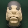 Foam latex prosthetic Bulldog Face placed on a plastic human face cast