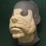 Foam latex prosthetic Bulldog Face placed on a plastic human face cast
