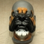 Bulldog Face hot foam latex prosthetic painted as a bulldog with brown, black and white, placed on a plastic human face cast