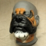 Bulldog Face hot foam latex prosthetic painted as a bulldog with brown, black and white, placed on a plastic human face cast