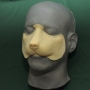 Small Fox Nose slush cast latex porsthetic placed on a plastic human face cast