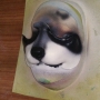 Small Fox Nose foam latex prosthetic placed on a plastic human face cast, painted as a raccoon