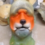 Small Fox Nose slush cast latex prosthetic placed on a plastic human face cast, painted as a cartoon fox
