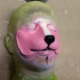 Small Fox Nose foam latex prosthetic placed on a plastic human face cast, painted as a pink skunk