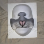 a painted foam latex prosthetic Large Rodent Nose placed on a plastic human face cast