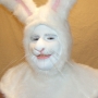 Man wearing foam latex prosthetic nose and makeup to look like an anthropomorphic white rabbit Man wearing foam latex prosthetic nose and makeup to look like an anthropomorphic white rabbit