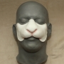a painted foam latex prosthetic Rabbit Nose placed on a plastic human face cast a painted foam latex prosthetic Rabbit Nose placed on a plastic human face cast