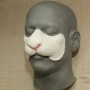 a painted foam latex prosthetic Rabbit Nose placed on a plastic human face cast a painted foam latex prosthetic Rabbit Nose placed on a plastic human face cast