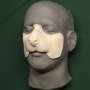 Foam Latex Small Rat Nose placed on a plastic human face cast