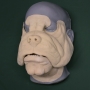 Slush cast latex prosthetic Bulldog Face placed on a plastic human face cast