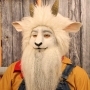 Man wearing foam latex prosthetic nose and makeup to look like an anthropomorphic white goat Man wearing foam latex prosthetic nose and makeup to look like an anthropomorphic white goat