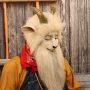 Man wearing foam latex prosthetic nose and makeup to look like an anthropomorphic white goat Man wearing foam latex prosthetic nose and makeup to look like an anthropomorphic white goat