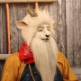 Man wearing foam latex prosthetic nose and makeup to look like an anthropomorphic white goat Man wearing foam latex prosthetic nose and makeup to look like an anthropomorphic white goat