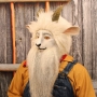 Man wearing foam latex prosthetic nose and makeup to look like an anthropomorphic white goat Man wearing foam latex prosthetic nose and makeup to look like an anthropomorphic white goat