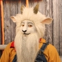 Man wearing foam latex prosthetic nose and makeup to look like an anthropomorphic white goat Man wearing foam latex prosthetic nose and makeup to look like an anthropomorphic white goat