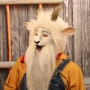 Man wearing foam latex prosthetic nose and makeup to look like an anthropomorphic white goat Man wearing foam latex prosthetic nose and makeup to look like an anthropomorphic white goat