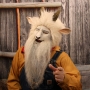 Man wearing foam latex prosthetic nose and makeup to look like an anthropomorphic white goat Man wearing foam latex prosthetic nose and makeup to look like an anthropomorphic white goat
