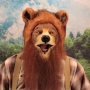 Man wearing latex prosthetic nose and makeup to look like an anthropomorphic brown grizzly bear.