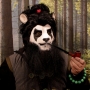 Man wearing foam latex prosthetic nose and makeup to look like a Pandaren from World of Warcraft. Man wearing foam latex prosthetic nose and makeup to look like a Pandaren from World of Warcraft.