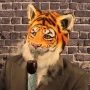 Man wearing foam latex prosthetic face and makeup to look like an anthropomorphic tiger, smoking a pipe. Man wearing foam latex prosthetic face and makeup to look like an anthropomorphic tiger, smoking a pipe.