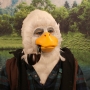 Man wearing foam latex prosthetic face and makeup to look like an anthropomorphic duck, smoking a pipe Man wearing foam latex prosthetic face and makeup to look like an anthropomorphic duck, smoking a pipe