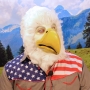 Man wearing latex prosthetic beak and makeup with feathers to look like an anthropomorphic American-themed bald eagle.
