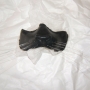Foam Latex Wild Cat Nose painted as a panther placed on tissue paper