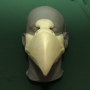 Foam latex prosthetic eagle beak placed on a plastic human face cast