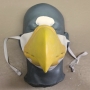 Slush cast latex prosthetic eagle beak placed on a plastic human face cast wiht a strap and painted as an eagle