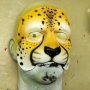 Foam Latex Cat Face is painted as a yellow cheetah and placed on a plastic human face cast Foam Latex Cat Face is painted as a yellow cheetah and placed on a plastic human face cast