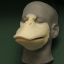 Foam Latex prosthetic Small Duck Bill placed on a plastic human face cast
