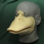 Slush Cast Latex prosthetic Small Duck Bill placed on a plastic human face cast