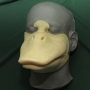 Slush Cast Latex prosthetic Small Duck Bill placed on a plastic human face cast