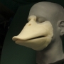 Foam Latex prosthetic Small Duck Bill placed on a plastic human face cast