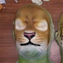 Foam Latex Cat Face is painted as a natural tan lion and placed on a plastic human face cast Foam Latex Cat Face is painted as a natural tan lion and placed on a plastic human face cast