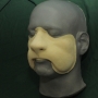 Slush Cast Latex Cowardly Lion Nose placed on a plastic human face cast