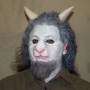 Man wearing foam latex prosthetic nose and makeup to look like an anthropomorphic white goat. Man wearing foam latex prosthetic nose and makeup to look like an anthropomorphic white goat.