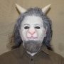 Man wearing foam latex prosthetic nose and makeup to look like an anthropomorphic white goat. Man wearing foam latex prosthetic nose and makeup to look like an anthropomorphic white goat.