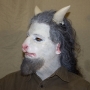 Man wearing foam latex prosthetic nose and makeup to look like an anthropomorphic white goat. Man wearing foam latex prosthetic nose and makeup to look like an anthropomorphic white goat.