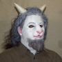 Man wearing foam latex prosthetic nose and makeup to look like an anthropomorphic white goat. Man wearing foam latex prosthetic nose and makeup to look like an anthropomorphic white goat.