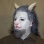 Man wearing foam latex prosthetic nose and makeup to look like an anthropomorphic white goat. Man wearing foam latex prosthetic nose and makeup to look like an anthropomorphic white goat.