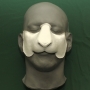 a foam latex prosthetic Sheep / Goat Nose painted white placed on a plastic human face cast a foam latex prosthetic Sheep / Goat Nose painted white placed on a plastic human face cast