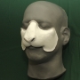 a foam latex prosthetic Sheep / Goat Nose painted white placed on a plastic human face cast a foam latex prosthetic Sheep / Goat Nose painted white placed on a plastic human face cast