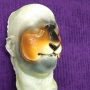 a foam latex prosthetic Sheep / Goat Nose painted in browns like a natural goat placed on a plastic human face cast a foam latex prosthetic Sheep / Goat Nose painted in browns like a natural goat placed on a plastic human face cast